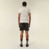 Polo-T-shirt i öppen mesh-stickning