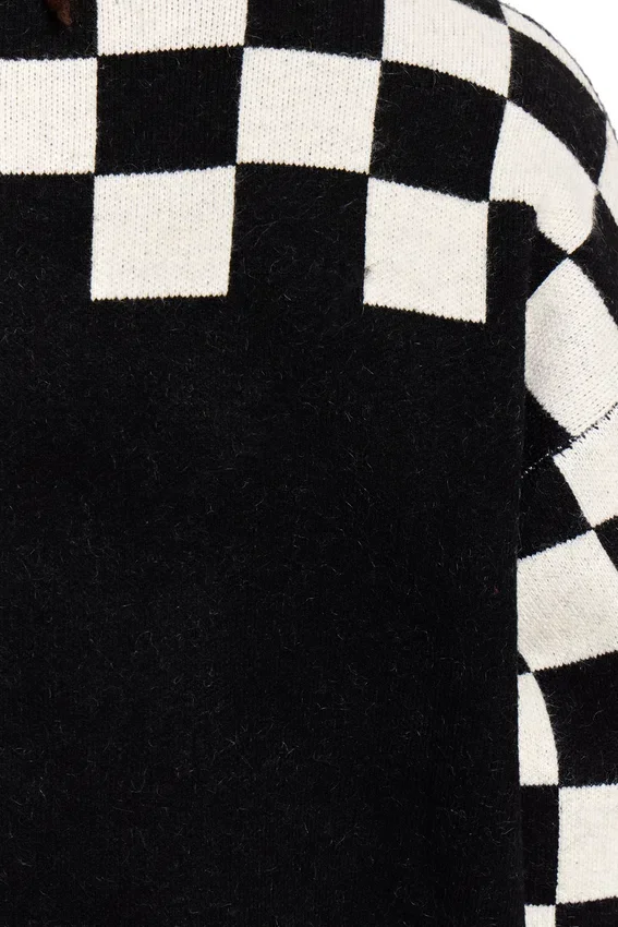 Stickad tröja med rutiga ärmar